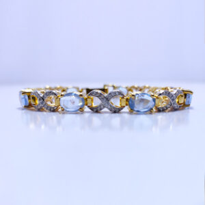 ROYAL SYNTHETIC CRYSTAL BLUE TOPAZ BRACELET WITH WHITE ZIRCONIA, RHODIUM GOLD PLATED